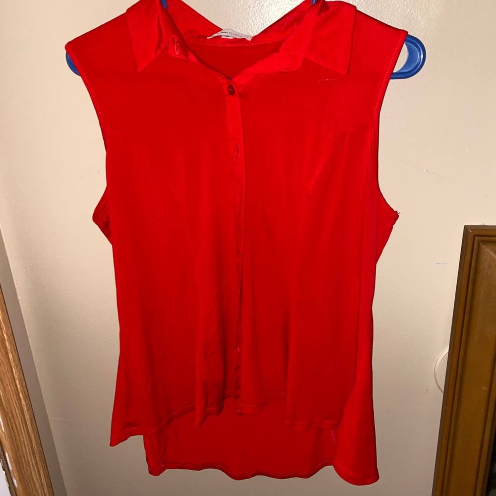 Sleeveless red button up blouse
